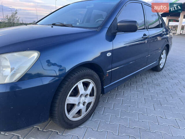 Синий Мицубиси Лансер, объемом двигателя 1.3 л и пробегом 290 тыс. км за 2999 $, фото 14 на Automoto.ua