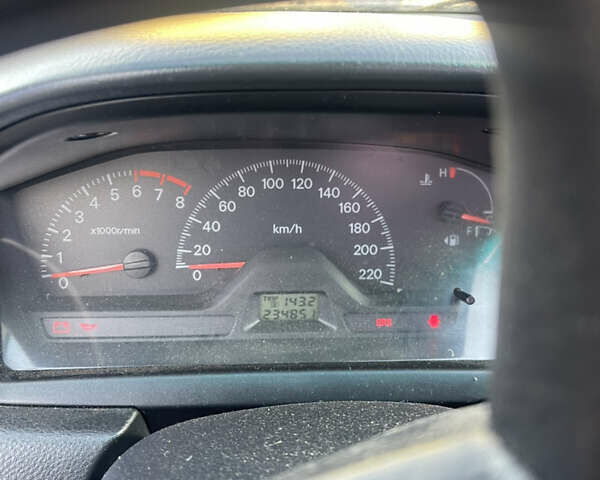 Синий Мицубиси Лансер, объемом двигателя 1.58 л и пробегом 234 тыс. км за 3500 $, фото 2 на Automoto.ua