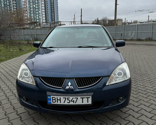 Синій Міцубісі Lancer, об'ємом двигуна 1.6 л та пробігом 200 тис. км за 5000 $, фото 1 на Automoto.ua