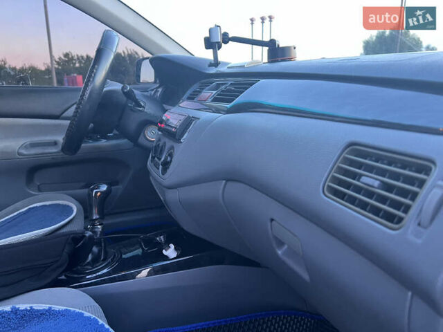 Синий Мицубиси Лансер, объемом двигателя 1.3 л и пробегом 290 тыс. км за 2999 $, фото 20 на Automoto.ua