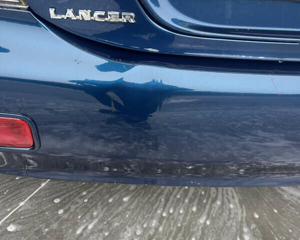 Синий Мицубиси Лансер, объемом двигателя 1.58 л и пробегом 234 тыс. км за 3500 $, фото 10 на Automoto.ua