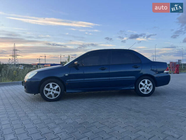 Синий Мицубиси Лансер, объемом двигателя 1.3 л и пробегом 290 тыс. км за 2999 $, фото 4 на Automoto.ua