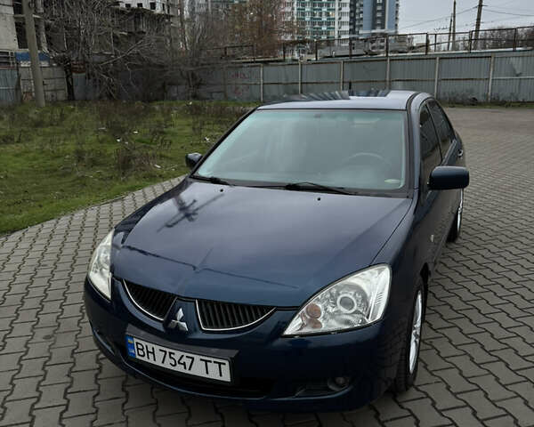 Синій Міцубісі Lancer, об'ємом двигуна 1.6 л та пробігом 200 тис. км за 5000 $, фото 2 на Automoto.ua