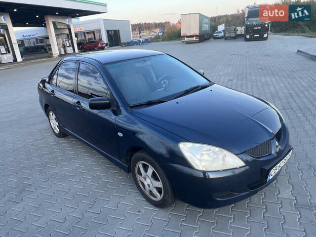 Синий Мицубиси Лансер, объемом двигателя 1.3 л и пробегом 290 тыс. км за 2999 $, фото 17 на Automoto.ua