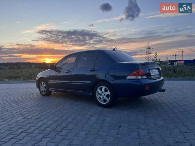 Синий Мицубиси Лансер, объемом двигателя 1.3 л и пробегом 290 тыс. км за 2999 $, фото 5 на Automoto.ua