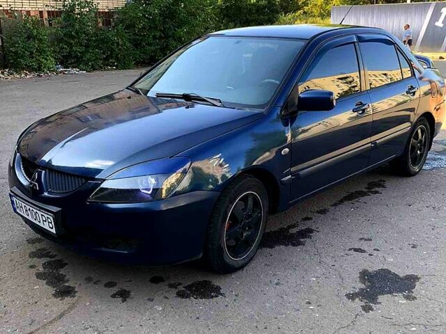 Синій Міцубісі Lancer, об'ємом двигуна 1.6 л та пробігом 248 тис. км за 4200 $, фото 9 на Automoto.ua