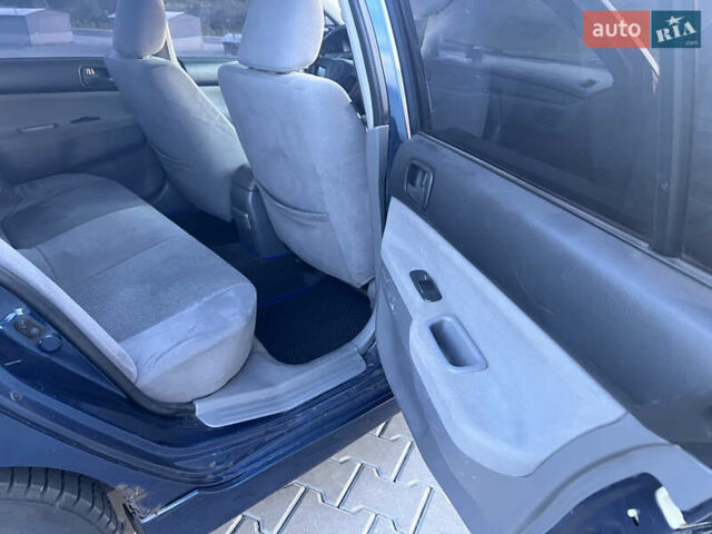 Синий Мицубиси Лансер, объемом двигателя 1.3 л и пробегом 290 тыс. км за 2999 $, фото 21 на Automoto.ua