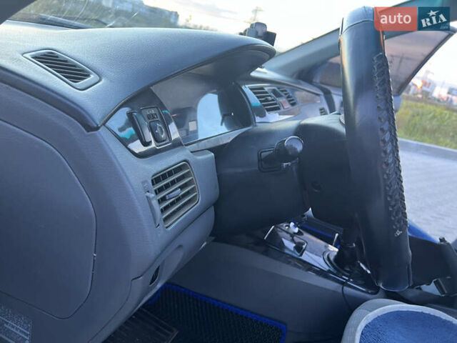 Синий Мицубиси Лансер, объемом двигателя 1.3 л и пробегом 290 тыс. км за 2999 $, фото 25 на Automoto.ua