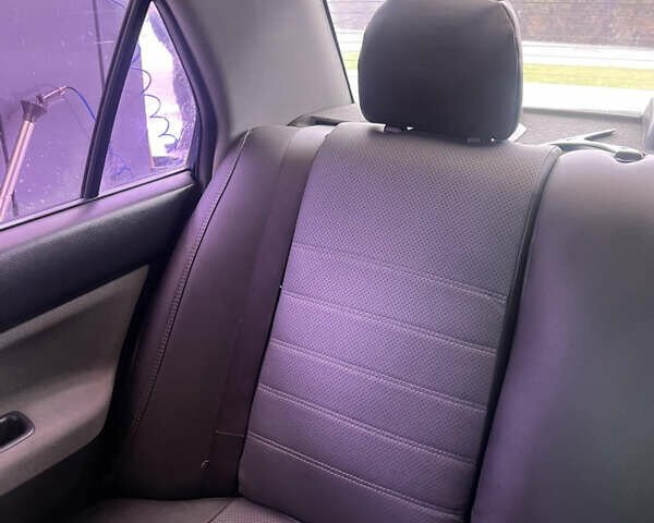 Синий Мицубиси Лансер, объемом двигателя 1.58 л и пробегом 234 тыс. км за 3500 $, фото 14 на Automoto.ua