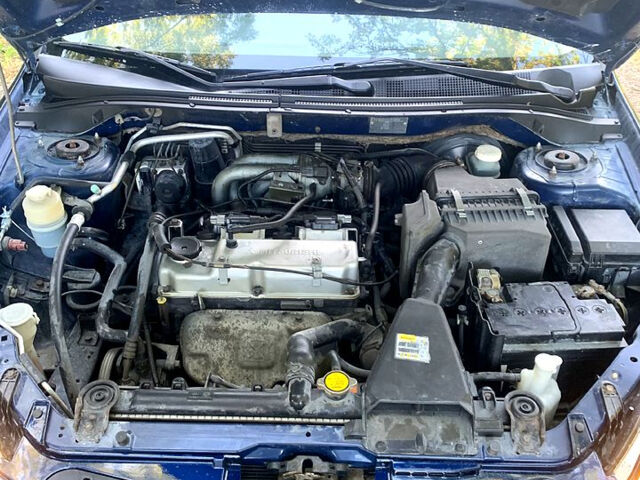 Синий Мицубиси Лансер, объемом двигателя 1.6 л и пробегом 295 тыс. км за 4550 $, фото 12 на Automoto.ua