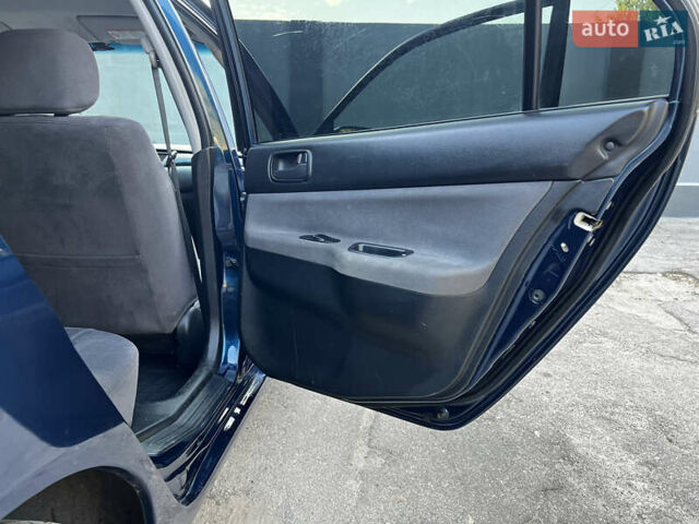 Синій Міцубісі Lancer, об'ємом двигуна 1.58 л та пробігом 324 тис. км за 4150 $, фото 19 на Automoto.ua