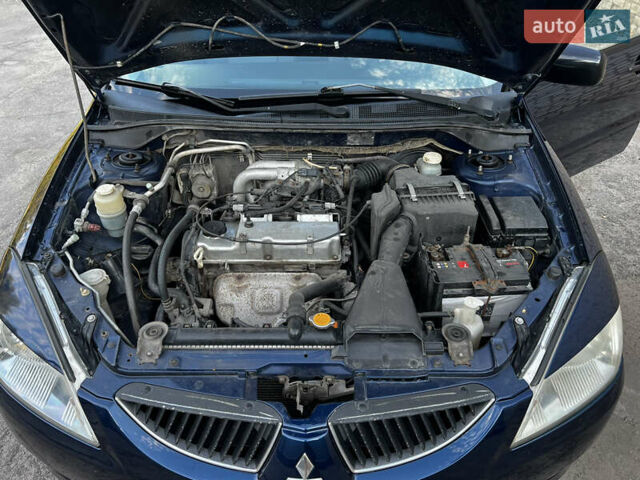 Синій Міцубісі Lancer, об'ємом двигуна 1.58 л та пробігом 324 тис. км за 4150 $, фото 23 на Automoto.ua