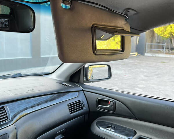 Синій Міцубісі Lancer, об'ємом двигуна 1.58 л та пробігом 324 тис. км за 4150 $, фото 14 на Automoto.ua