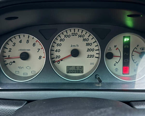 Синій Міцубісі Lancer, об'ємом двигуна 1.6 л та пробігом 200 тис. км за 5000 $, фото 12 на Automoto.ua