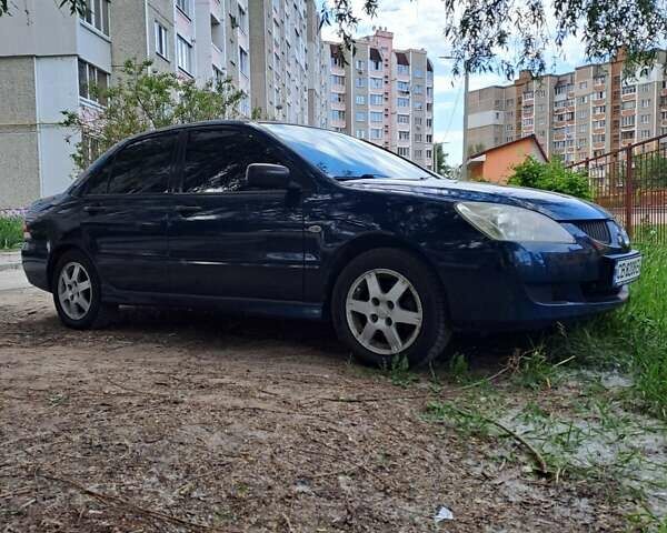 Синій Міцубісі Lancer, об'ємом двигуна 1.3 л та пробігом 260 тис. км за 3800 $, фото 3 на Automoto.ua