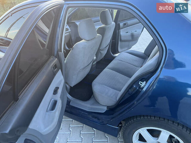 Синий Мицубиси Лансер, объемом двигателя 1.3 л и пробегом 290 тыс. км за 2999 $, фото 23 на Automoto.ua