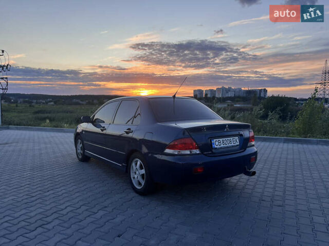 Синий Мицубиси Лансер, объемом двигателя 1.3 л и пробегом 290 тыс. км за 2999 $, фото 6 на Automoto.ua