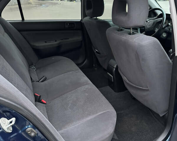Синій Міцубісі Lancer, об'ємом двигуна 1.6 л та пробігом 200 тис. км за 5000 $, фото 7 на Automoto.ua