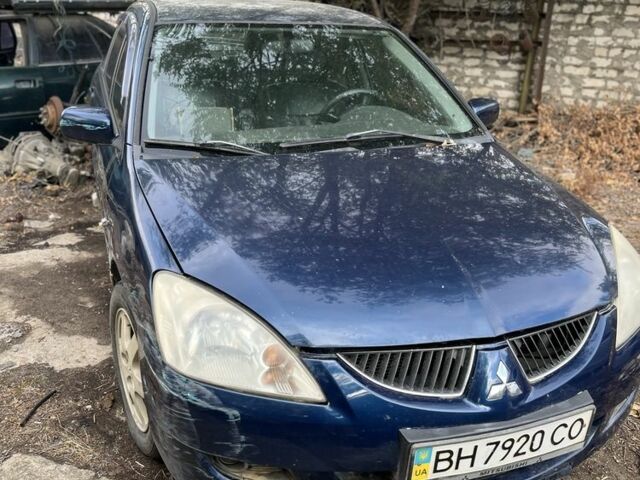 Синій Міцубісі Lancer, об'ємом двигуна 1.6 л та пробігом 200 тис. км за 1199 $, фото 1 на Automoto.ua