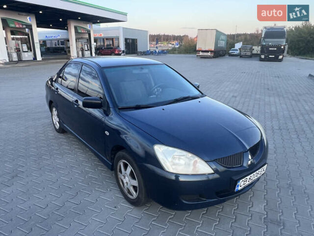 Синий Мицубиси Лансер, объемом двигателя 1.3 л и пробегом 290 тыс. км за 2999 $, фото 18 на Automoto.ua