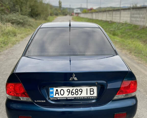 Синий Мицубиси Лансер, объемом двигателя 1.58 л и пробегом 250 тыс. км за 2750 $, фото 4 на Automoto.ua