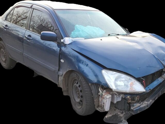 Синий Мицубиси Лансер, объемом двигателя 1 л и пробегом 380 тыс. км за 1421 $, фото 1 на Automoto.ua