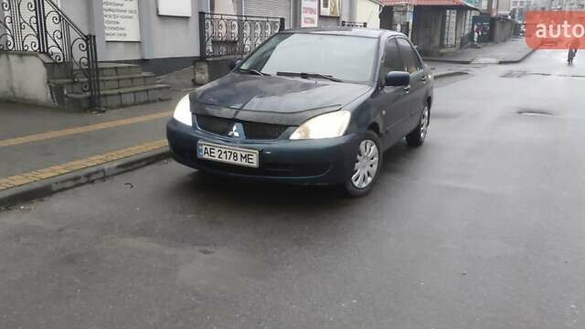 Синий Мицубиси Лансер, объемом двигателя 1.58 л и пробегом 358 тыс. км за 3500 $, фото 2 на Automoto.ua