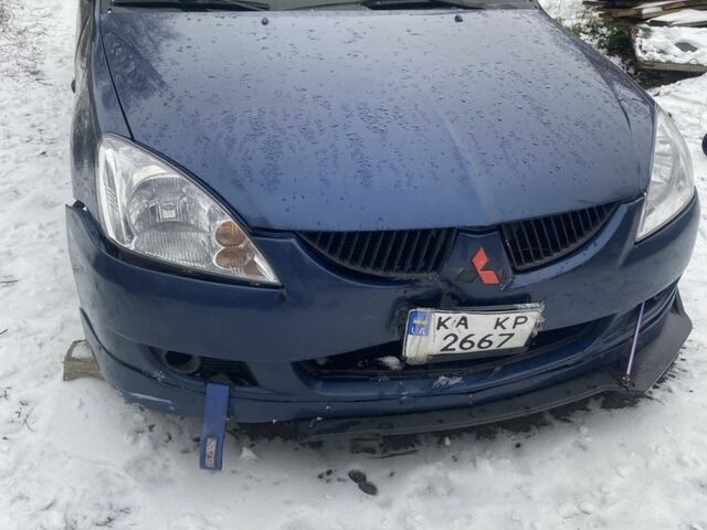 Синий Мицубиси Лансер, объемом двигателя 2 л и пробегом 320 тыс. км за 2700 $, фото 3 на Automoto.ua