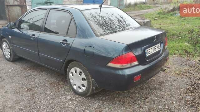 Синий Мицубиси Лансер, объемом двигателя 1.58 л и пробегом 358 тыс. км за 3500 $, фото 9 на Automoto.ua