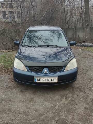 Синий Мицубиси Лансер, объемом двигателя 1.58 л и пробегом 358 тыс. км за 3500 $, фото 7 на Automoto.ua