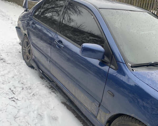 Синій Міцубісі Lancer, об'ємом двигуна 2 л та пробігом 320 тис. км за 2700 $, фото 11 на Automoto.ua