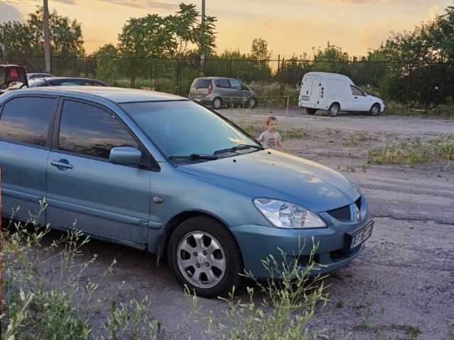 Синий Мицубиси Лансер, объемом двигателя 0 л и пробегом 243 тыс. км за 4300 $, фото 2 на Automoto.ua