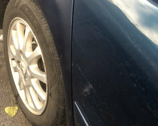 Синій Міцубісі Lancer, об'ємом двигуна 1.58 л та пробігом 346 тис. км за 4500 $, фото 4 на Automoto.ua