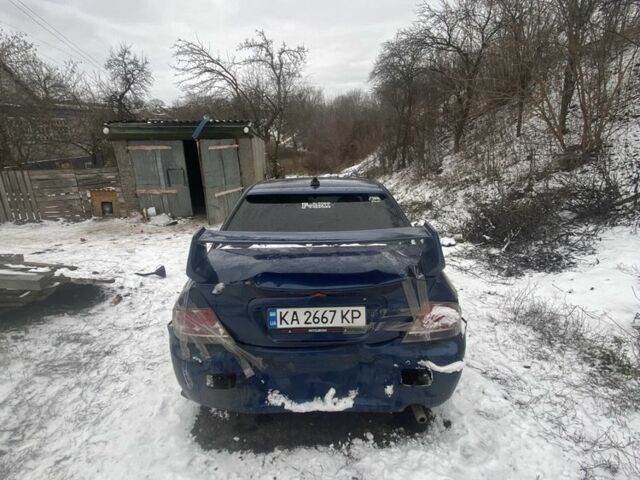 Синий Мицубиси Лансер, объемом двигателя 2 л и пробегом 320 тыс. км за 2700 $, фото 7 на Automoto.ua