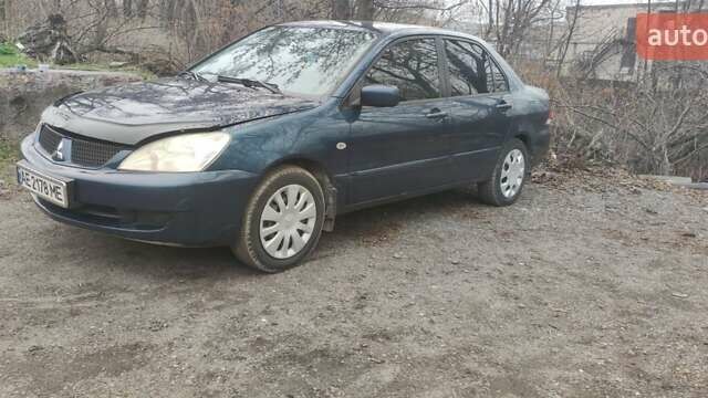 Синий Мицубиси Лансер, объемом двигателя 1.58 л и пробегом 358 тыс. км за 3500 $, фото 8 на Automoto.ua