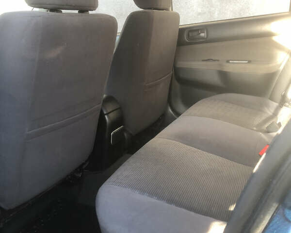 Синій Міцубісі Lancer, об'ємом двигуна 1.58 л та пробігом 346 тис. км за 4500 $, фото 11 на Automoto.ua