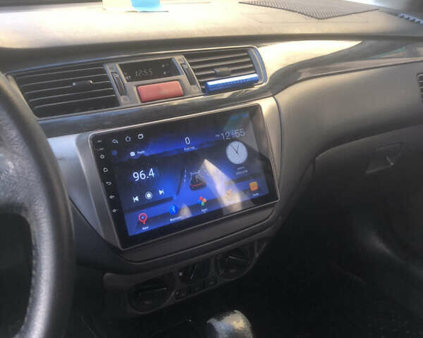 Синій Міцубісі Lancer, об'ємом двигуна 1.58 л та пробігом 346 тис. км за 4500 $, фото 8 на Automoto.ua