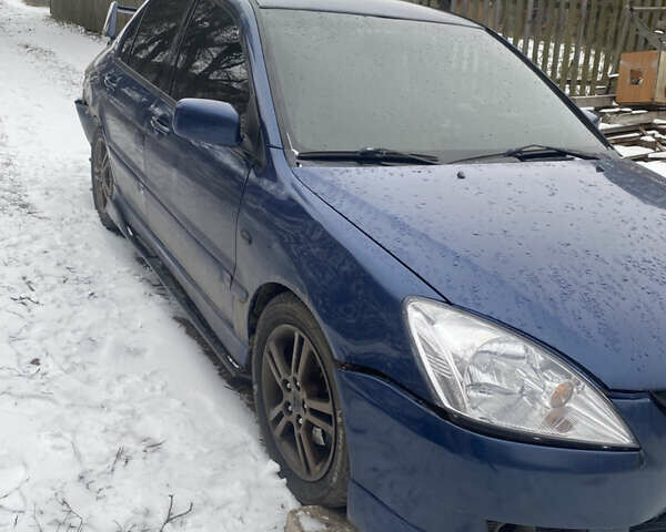 Синій Міцубісі Lancer, об'ємом двигуна 2 л та пробігом 320 тис. км за 2700 $, фото 14 на Automoto.ua