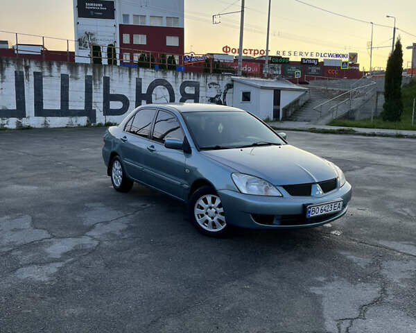 Синій Міцубісі Lancer, об'ємом двигуна 1.6 л та пробігом 237 тис. км за 4099 $, фото 6 на Automoto.ua