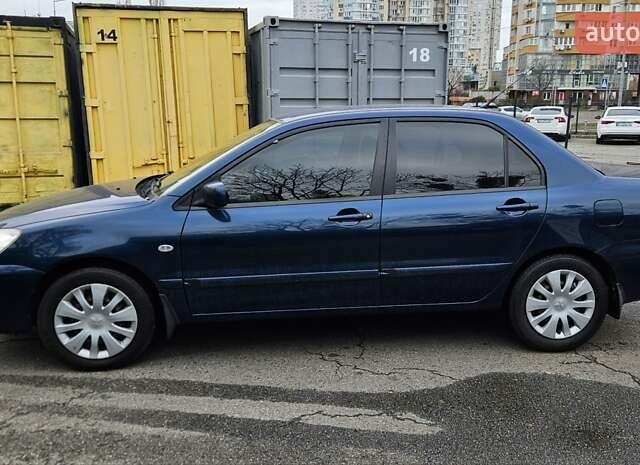 Синий Мицубиси Лансер, объемом двигателя 1.62 л и пробегом 114 тыс. км за 5200 $, фото 3 на Automoto.ua