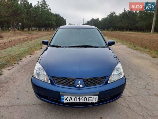 Синий Мицубиси Лансер, объемом двигателя 1.6 л и пробегом 222 тыс. км за 4599 $, фото 9 на Automoto.ua
