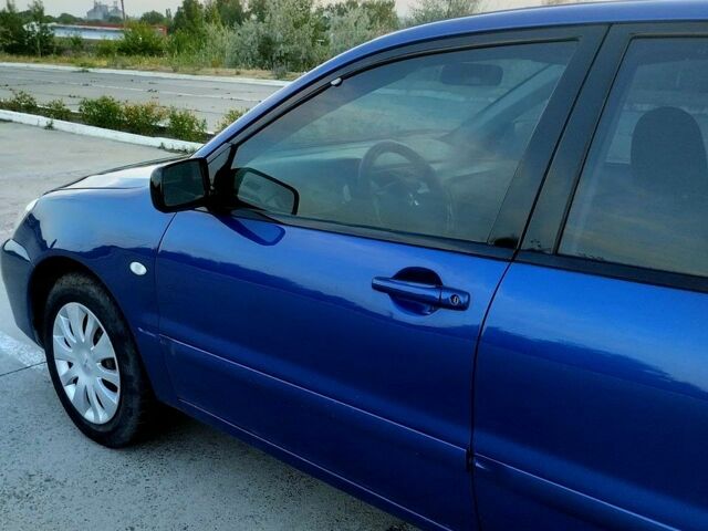 Синій Міцубісі Lancer, об'ємом двигуна 1.6 л та пробігом 0 тис. км за 3500 $, фото 1 на Automoto.ua
