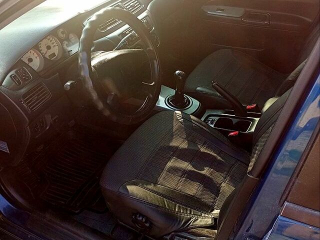 Синий Мицубиси Лансер, объемом двигателя 1.6 л и пробегом 305 тыс. км за 3500 $, фото 4 на Automoto.ua