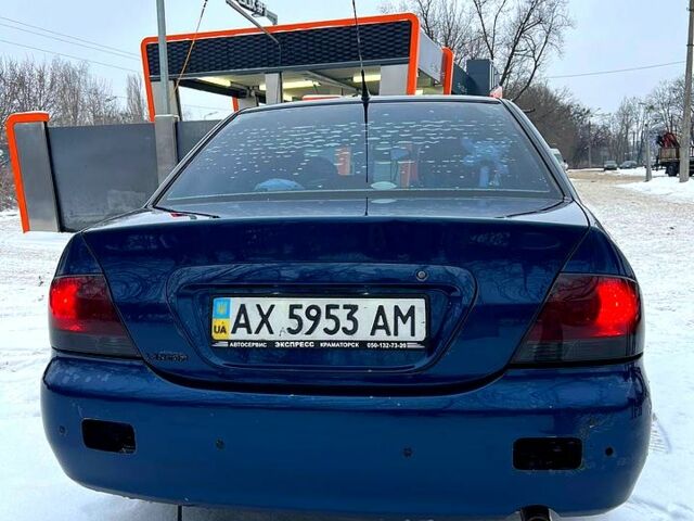 Синій Міцубісі Lancer, об'ємом двигуна 1.6 л та пробігом 185 тис. км за 4575 $, фото 8 на Automoto.ua