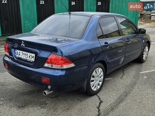 Синий Мицубиси Лансер, объемом двигателя 1.62 л и пробегом 114 тыс. км за 5200 $, фото 6 на Automoto.ua