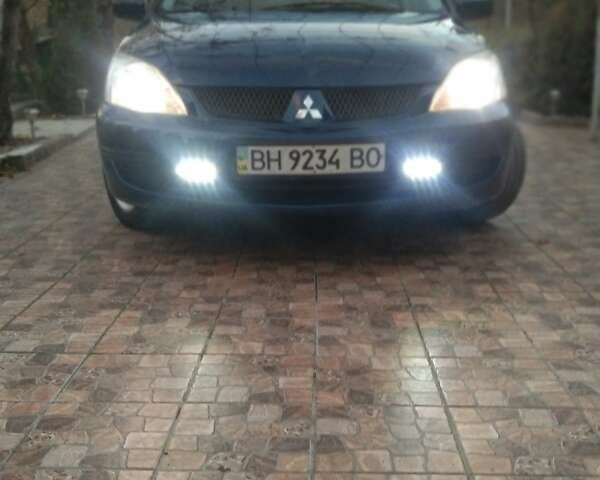 Синий Мицубиси Лансер, объемом двигателя 1.58 л и пробегом 195 тыс. км за 3990 $, фото 1 на Automoto.ua