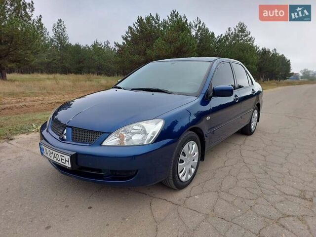 Синий Мицубиси Лансер, объемом двигателя 1.6 л и пробегом 222 тыс. км за 4599 $, фото 1 на Automoto.ua