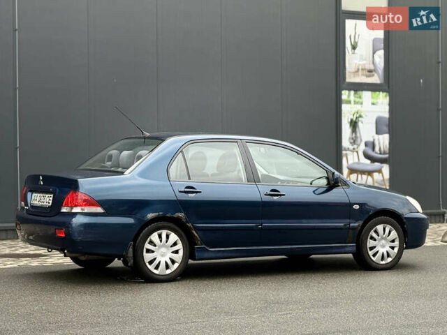 Синій Міцубісі Lancer, об'ємом двигуна 1.58 л та пробігом 513 тис. км за 2500 $, фото 10 на Automoto.ua