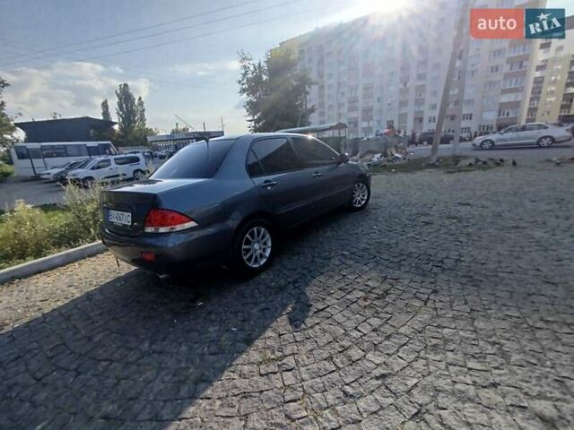 Синій Міцубісі Lancer, об'ємом двигуна 1.6 л та пробігом 290 тис. км за 4100 $, фото 1 на Automoto.ua