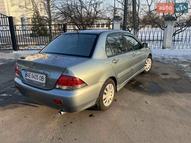Синий Мицубиси Лансер, объемом двигателя 1.6 л и пробегом 172 тыс. км за 5900 $, фото 9 на Automoto.ua